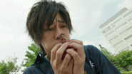 Kouta eating a Helheim fruit; later turned into an Over Lord Inves