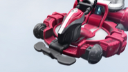 Banno, in his tablet form, rides in on the Red Booster and uses it to attack Drive and Mach