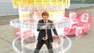 a set of tire tracks can surround Shinnosuke as Tridoron begins to glow where...