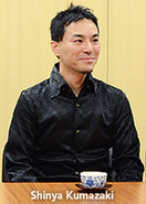 Shinya Kumazaki attends the Kirby's Return to Dream Land Iwata Asks interview.