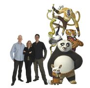 Characters and filmmakers pose, featuring directors John Stevenson (left) and Mark Osborne (right), and producer Melissa Cobb (center) with Po, Shifu, and the Furious Five