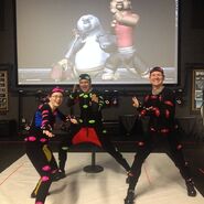 Crew members filming in motion-capture suits