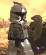 Clone Trooper wielding a Battle Droid's head.