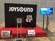 Brave fans could try out JOYSOUND's karaoke machine, on display during the event.