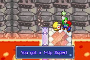 A Presenter awarding a 1-Up Super.