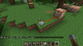 The second image released by Mojang showing the block giving glass to the player.