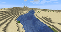 A river running through a desert biome.