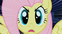 Fluttershy using the "Stare" against the cockatrice