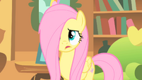 Fluttershy blows away her hair.