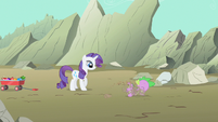 Rarity a safe distance from the flying dirt.