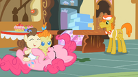 Pinkie Pie is having fun with the babies.