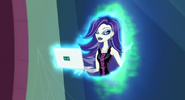 Spectra and her laptop from the stairway.