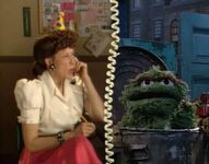 Lily Tomlin as Ernestine in Sesame Street Stays Up Late, and also in Here Come the Muppets and Kermit Unpigged