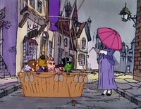 A rare full view of Nanny in "Around the Nursery in 80 Days", her face covered with a parasol