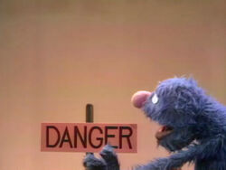 Grover danger sign