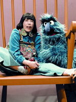 Lily Tomlin as Edith Ann in an insert with Herry Monster