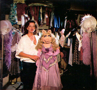 Barbara Davis showcasing her work on Miss Piggy.