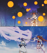 (top) Teana's version of Cross Fire Shoot (bottom) Nanoha fires Cross Fire Shoot