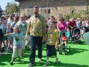 Joe with his 2 children Jordy (right) and Sophia (left) at A Bug's Land at Disney California Adventures.