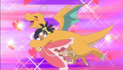 Ash's Dragonite hugs Iris