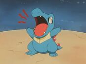 Totodile yawns