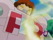 Team Rocket uses the mirror to deflect the attack