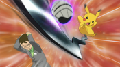 Pikachu uses Iron Tail on the helmet