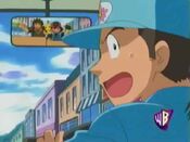 The man is startled Ash and Brock are running towards him