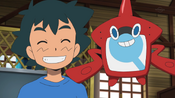 Ash and Rotom grin