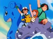 The heroes wave goodbye, now with Lapras by their side