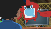 Rotom warns Ash he can't write a couple of sentences for the assignment