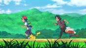 Ash, Pikachu, Goh, and Raboot heading to the Vermilion City Gym.