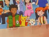 Pikachu and Togepi cheer for Ash