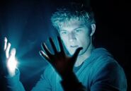 Number Four (Lorien Legacies) uses his Lumen legacy to generate light from his palms.