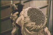 Mushizō's (Ninja Scroll) hunched back is used as a hornet's nest.