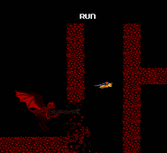 Red (NES Godzilla Creepypasta) using his inner jaw to smash through a wall blocking his way.