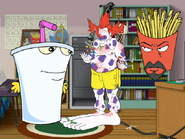 Through the wig given to him by Bingo, Carl Brutananadilewski (Aqua Teen Hunger Force) has transformed into a clown.