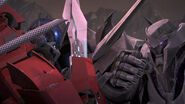 Optimus and Megatron (Transformers: Prime) clashing their blades.