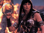 Xena (Xena: Warrior Princess) often uses her chakram to this effect.