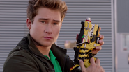 Riley Griffin, Dino Charge Green Ranger, temporary via Body swap