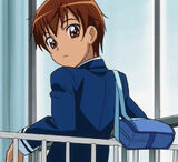 Genki carrying the school-issued bag for boys