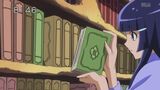 Reika holding one of the fairytale books