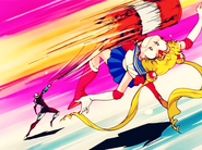 Gamecen attacking Sailor Moon with his mallet