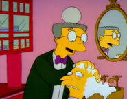 Mr. Burns getting his sideburns washed by Smithers