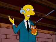 Burns with one of the Simpsons' greyhound puppies