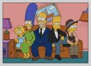 The Simpsons 6 years later. Maggie is 7, Marge is 42, Homer is 45, Bart is 16, and Lisa is 14. Bart is dressed as the Fonz, while Lisa is dressed as Annie Hall. 2017