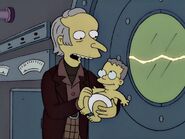 A younger Burns meeting baby Waylon Smithers Jr for the first time