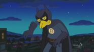 Mr. Burns, as Fruit Bat Man, poses for a picture that is taken by Smithers