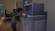 A child using the microwave