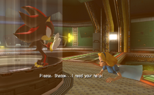 In-game screenshot of Shadow the Hedgehog depicting a flashback with a warmer color toning. On the left is Shadow inside an escape pod, looking with a concerned expression. Outside the pod is a kneeling Maria talking to him. The in-game subtitles read "Please, Shadow... I need your help!" from Maria.